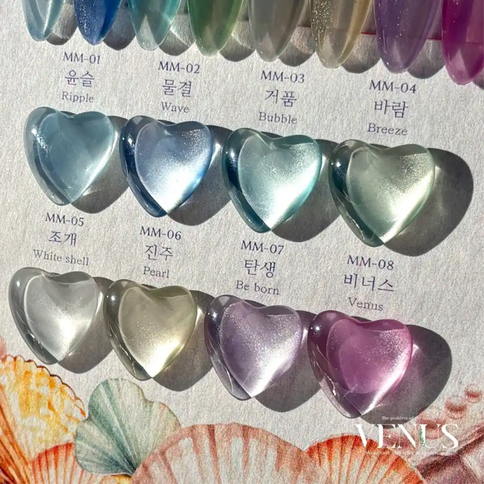 The alt text for this image of the "MAYO Venus Collection 8pcs/Set" Shopify product could be:
"This image showcases the MAYO Venus Collection, a set of 8 soft and silky magnetic gels inspired by the goddess of love. The gels feature fine glittering particles that create a satin-like finish. The set includes a variety of shades and shapes, such as ripples, waves, bubbles, and heart-shaped designs in colors like blue, green, white, and purple.