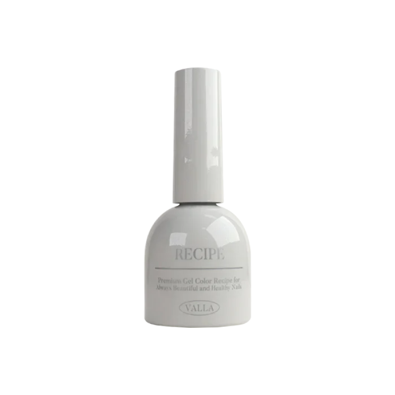A polished, glossy nail polish bottle in a soft, pastel pink shade, part of the VALLA Dewy Collection. The bottle features a cylindrical design with a smooth, reflective surface, capturing the essence of the brand's "silky effect" and "high quality smooth cat eye" formulation.