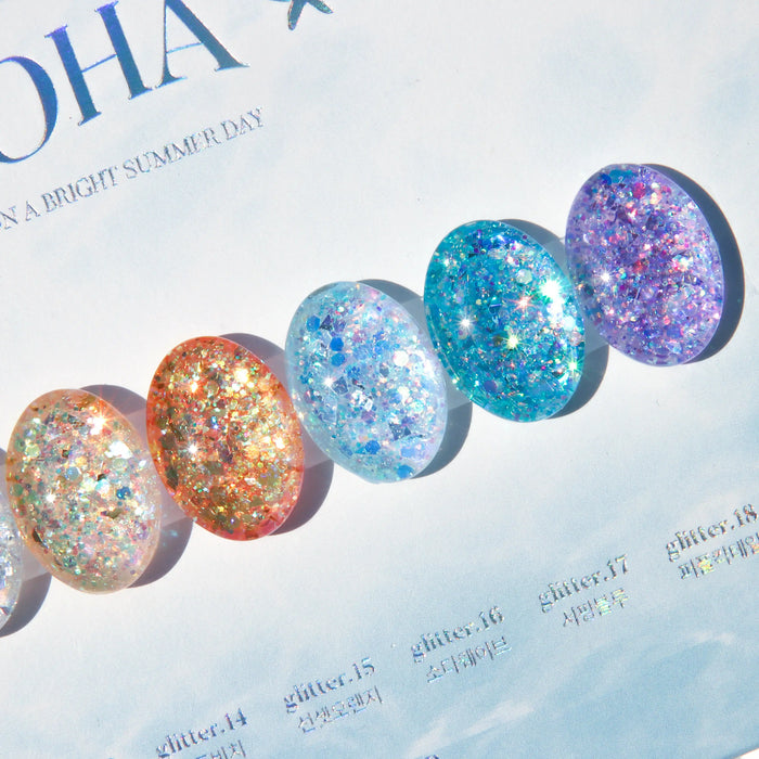 Vibrant and radiant Yogurt Nail Aloha Collection gel polishes, capturing the essence of sun-kissed days with sparkling blues, tropical pinks, and glitter-infused hues. This captivating image showcases the collection's diverse range of colors, perfect for expressing your individual style. Shopify, Yogurt, Aloha, Nail Polish, Gel Polish, Glitter.