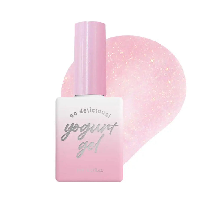 A pastel pink Yogurt gel polish bottle with a shimmering, iridescent effect and delightful packaging design, perfect for creating a subtle, elegant nail look that emphasizes the color gel underneath. The "Yogurt In The Mood For Love Collection" offers a dazzling, limited-edition set of 9 glitter gels, providing a beautiful shine and dainty finish for the modern, fashion-forward Shopify customer.