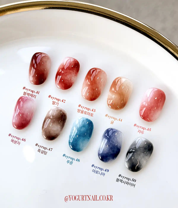 A collection of colorful, self-leveling gel polishes reminiscent of candied tanghulu fruit, offering a wide range of deep, rich hues to choose from. The Yogurt Tanghulu Collection provides a vibrant and captivating nail art experience, with easy-to-use gel formulas that cure under UV/LED light for long-lasting, glossy results.