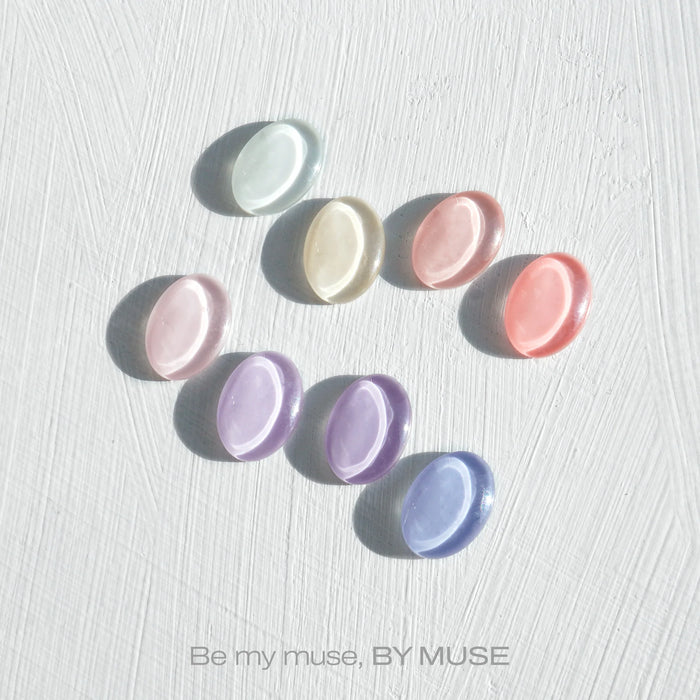 40 pcs of colorful syrup gel nail polish by the Shopify brand ByMuse, featuring a collection of various pastel-toned nail gel products in an assortment of shades, including pink, purple, and white.