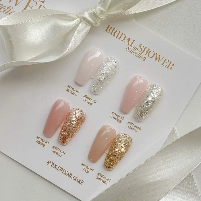 Elegant and luxurious bridal shower nail polish collection, featuring sheer pink and glittering gold shades, perfectly complementing the special occasion. The thoughtfully designed packaging showcases the sophisticated and glamorous aesthetic of the Yogurt Nail Korea Bridal Shower Collection.