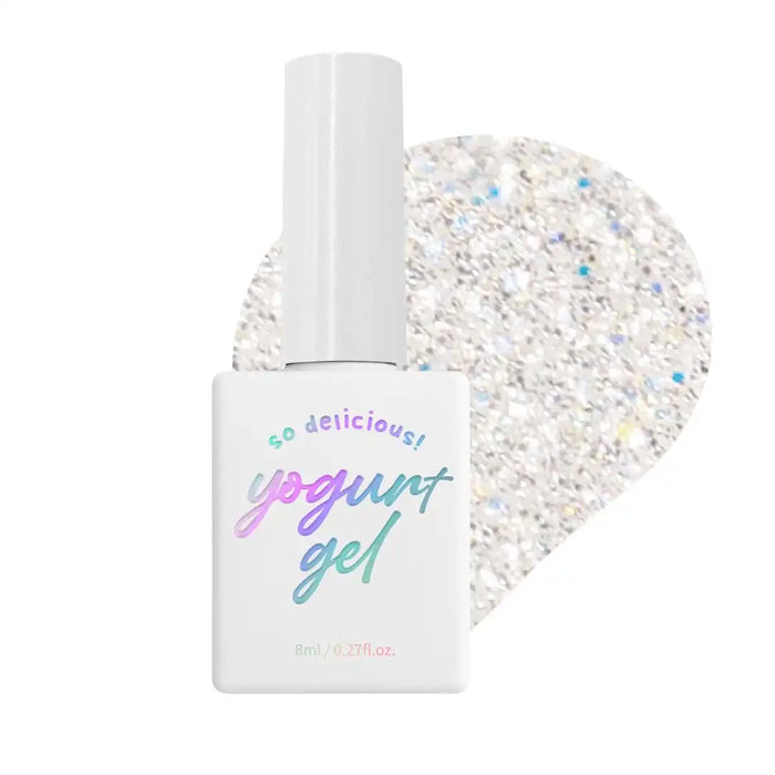 Visually appealing image featuring the "YOGURT New Things Collection" Glitter gel polish product. The product is showcased in a white bottle with the brand name prominently displayed. The bottle is surrounded by a sparkling, multicolored glitter gel, highlighting the glittery and vibrant nature of the nail polish collection. This alt text captures the essence of the product's design and characteristics, providing an informative and descriptive ov