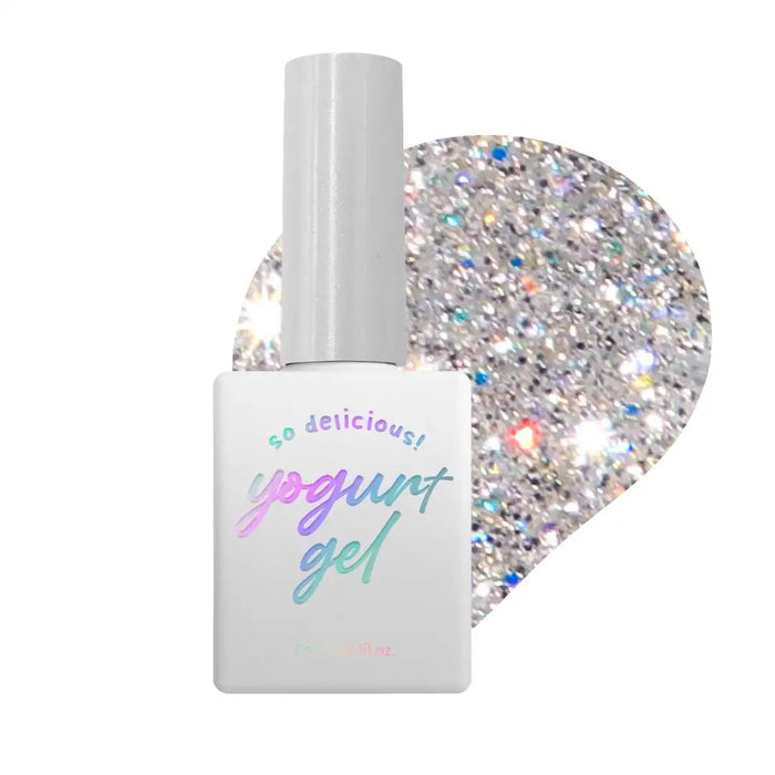 Elaborative ALT text: A bottle of Yogurt New Things Collection, a set of 6 beautiful glitter gel polishes made by the Delicious Yogurt brand. The bottle features a white label with the brand name and product description, showcasing the vibrant and sparkling glitter gel formula within. This collection offers a range of stunning, high-quality gel polishes that can be purchased individually to suit various personal style preferences and nail care ne