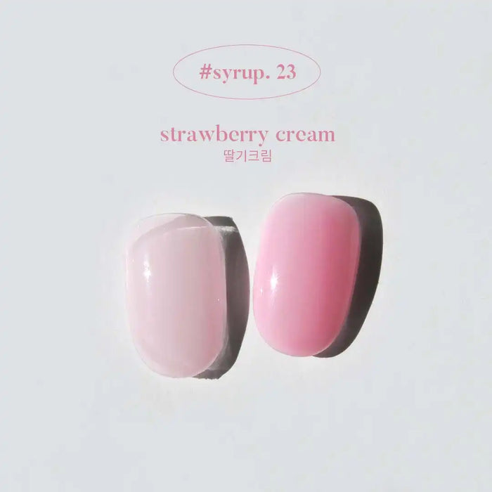 Descriptive alt text for the "YOGURT Gelato collection" Shopify product image: 
The image shows two round, soft-looking gels in a light pink and darker pink color. The text overlay indicates this is "strawberry cream" syrup #23 from the "YOGURT Gelato collection" product line. The packaging and design elements evoke a high-quality, premium cosmetics or beauty product.