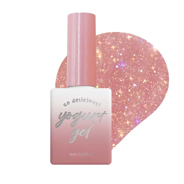 Elegant and radiant pink nail polish bottle with a sparkling glitter effect, showcasing the Yogurt Nail Gel "In The Mood For Love 2 Collection" product line. The long, elaborative alt text highlights the luxurious, winter wonderland-inspired design and the allure of the premium Yogurt brand.