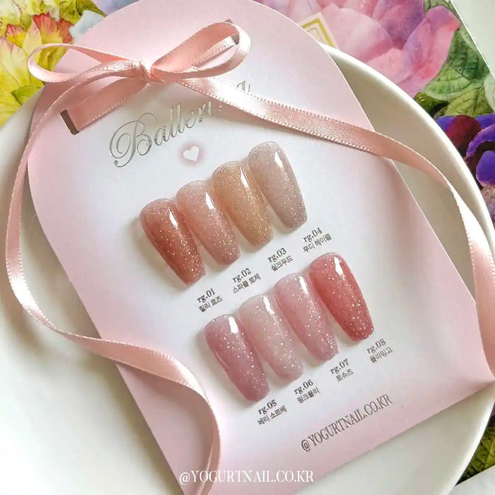 Elegant pink and pastel floral backdrop showcasing swatches of the Yogurt Ballerina 1 Collection, a set of soft, reflective gel nail polishes in complementary pink tones. The product description highlights the vibrant, self-leveling formula and the importance of proper storage to maintain the integrity of the gels.