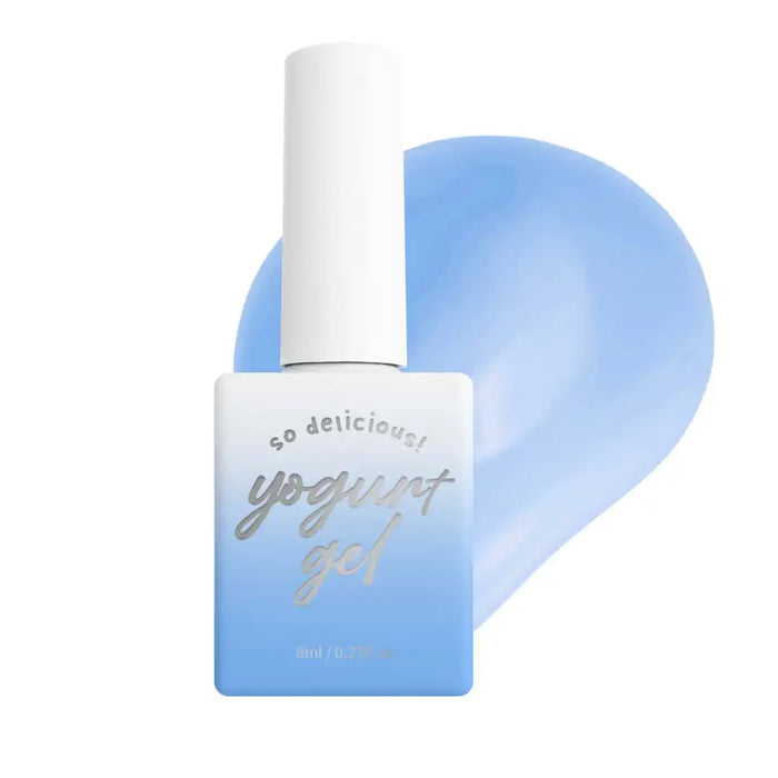 The alt text for this image of the Shopify product "YOGURT Gelato collection" could be: Delightful mid-viscosity gelato-inspired nail polish in a vibrant blue hue, featuring a sleek white bottle with the product name "Yogurt Gel" displayed in a graceful script font. This limited edition set comes in a stylish boxed packaging, complete with a color chart for the user to customize their manicure.