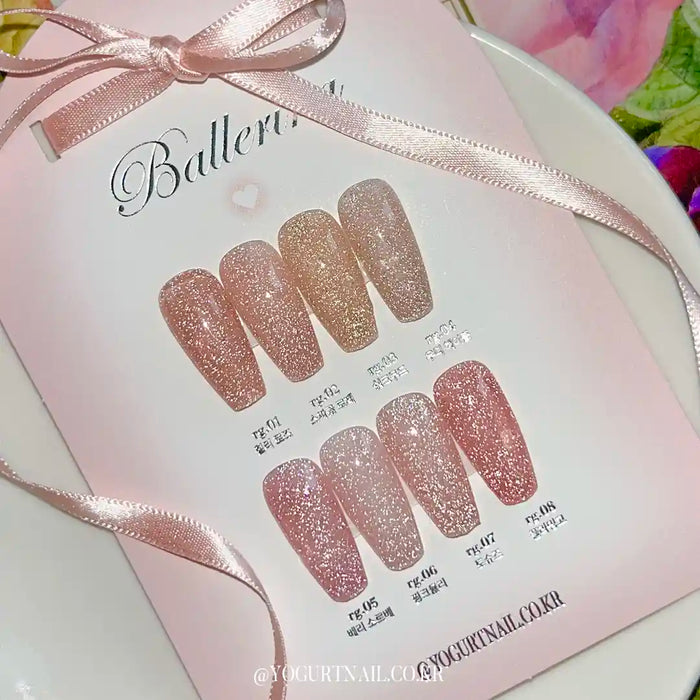 Elegant pink glitter nails from the Yogurt Ballerina 1 Collection, showcasing the reflective, self-leveling gel polish shades that perfectly match the soft, feminine tone of ballet-inspired nails. This versatile and on-trend nail product line from the Yogurt brand offers a high-quality, professional-looking manicure experience.