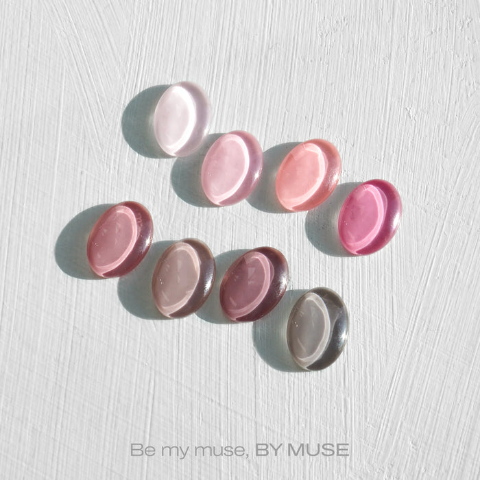 Vibrant syrup gels in pastel hues showcase the chic and modern "Be My Muse" collection by the Shopify brand BY MUSE. This diverse 40-piece set includes 32 syrup gels and 8 tinted syrups, all crafted with HEMA-free formulas that cure under 60s UV/LED lights. The elegant and innovative design of this Shopify product offers a versatile, high-quality nail care experience.