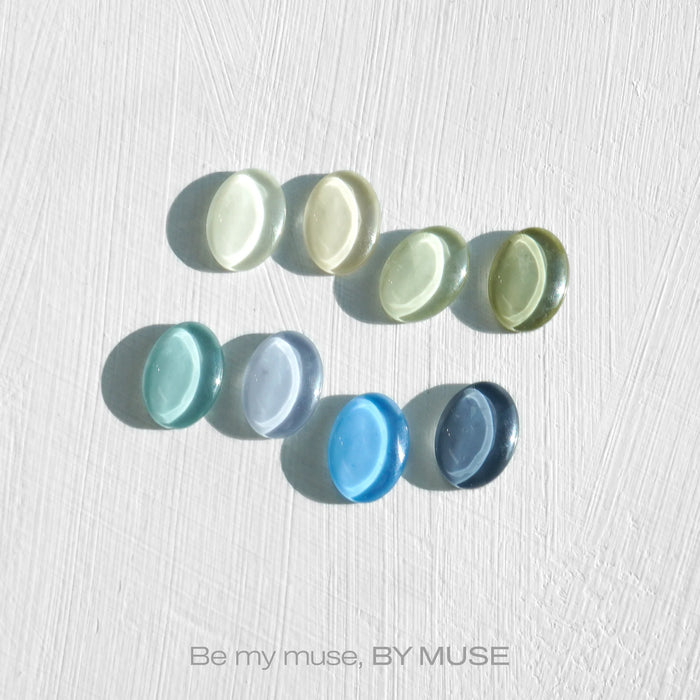 The image shows a collection of colorful syrup gel products from the brand "BY MUSE". The product is titled "BY MUSE 40 pcs" and the image displays a variety of round, gel-like syrup products in different pastel shades, including green, blue, and grey tones. This diverse collection of syrup gels and tinted syrups is part of the "Be My Muse" series by the brand BY MUSE, showcasing their range of HEMA-free, 60s UV/LED curable nail products.