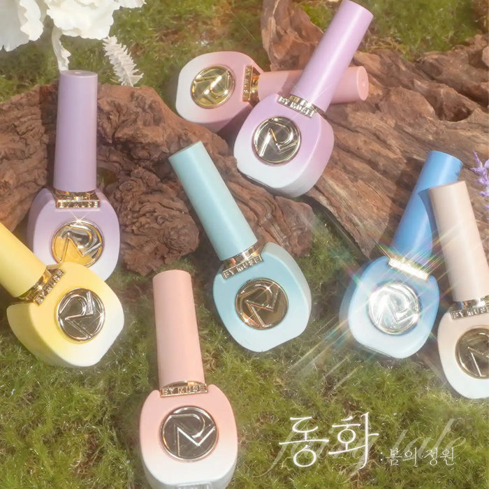 Enchanting array of pastel nail polish bottles from BY MUSE Fairy Tail Collection, featuring eight dreamy spring colors, displayed on moss-covered wood in a forest setting, evoking a magical fairy tale atmosphere