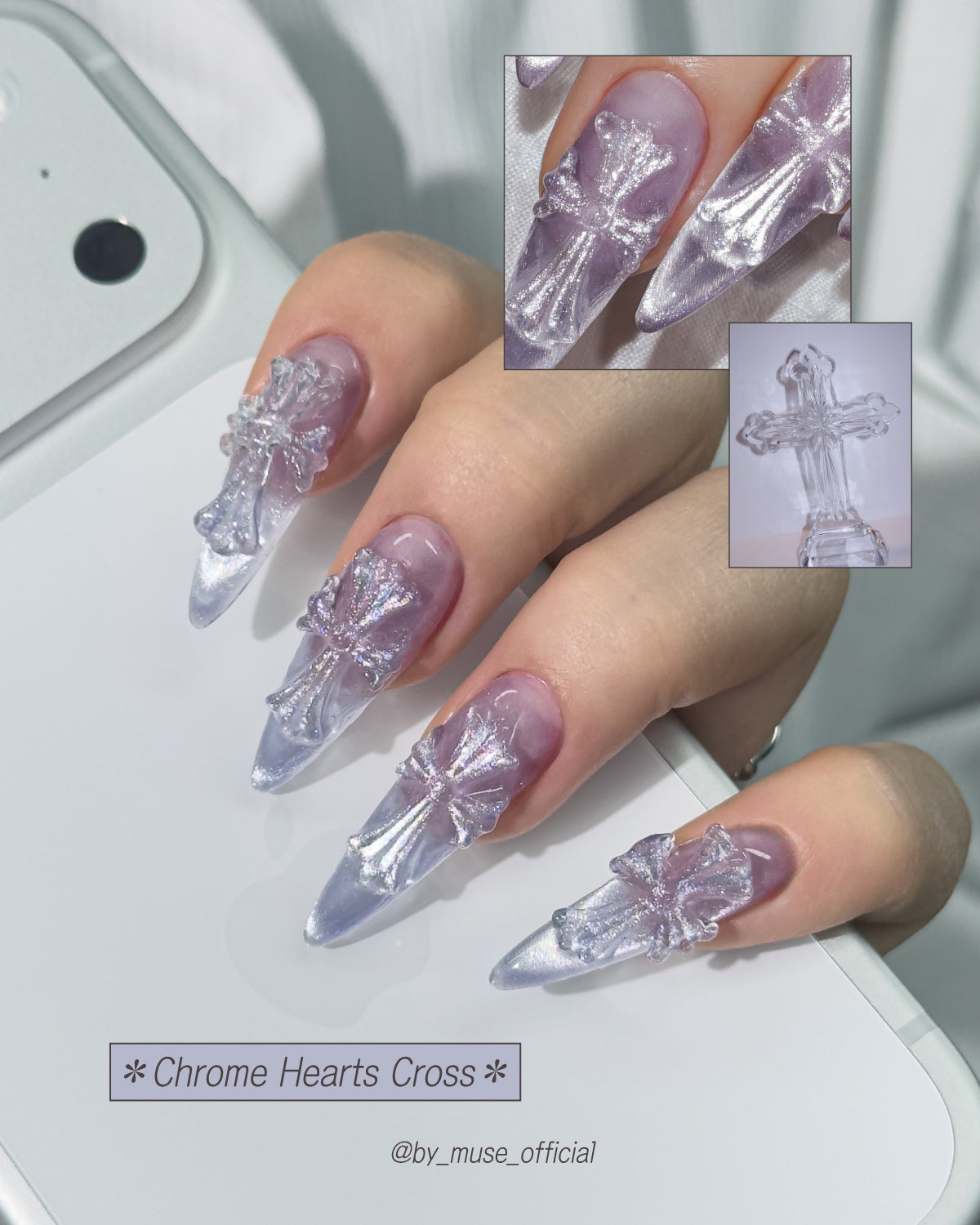 Nail art with butterfly and cross designs on a neutral background