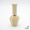 Elegant beige nail polish bottle from ADORELLE Romantic Vintage collection, featuring a sleek hexagonal base and tall cylindrical cap. The bottle showcases a sophisticated design with subtle branding, perfect for capturing the essence of vintage-inspired, romantic nail colors in a premium 18ml size.