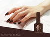 Elegant, carefully manicured hands showcase the BESSIE Bitter Sweet Collection 7-piece nail polish set, highlighting the rich, autumnal hues and premium quality of the brand's nail care products. This alt text emphasizes the luxurious and sophisticated aesthetic of the BESSIE nail polish line, capturing the essence of the "Bitter Sweet" collection's alluring color palette.