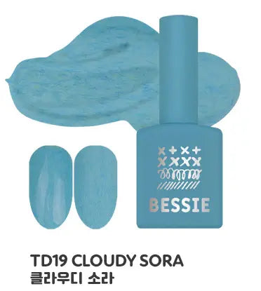 A vibrant, cloudy sky-blue nail polish set from the BESSIE Fluffy Collection, featuring a bottle with the brand name prominently displayed. The set includes multiple shades of the same cool, calming blue tone, perfect for creating a cohesive winter nail look. The rich, creamy formula and fluffy texture evoke a cozy, snowy atmosphere, making this an ideal choice for the colder months.