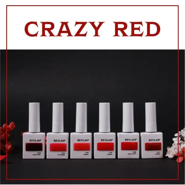 A row of six red gel nail polish bottles, with the brand name "BEVLAH" and the collection name "Crazy Red" displayed prominently above the image. The bottles are arranged in a visually appealing manner, with a white background and a contrasting black border to make the red polish the focal point.