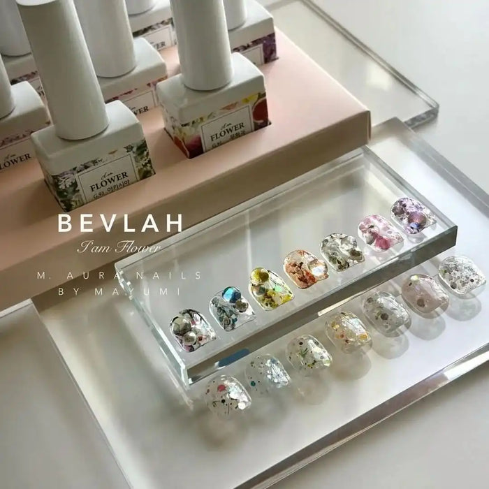 Vibrant and enchanting flower gel nail polish display showcasing the BEVLAH I Am Flower collection, a dazzling array of real blooms and glitters in various sizes, shapes, and types, showcasing the brand's commitment to quality and nature-inspired beauty. , BEVLAH, Nail polish, Nail care