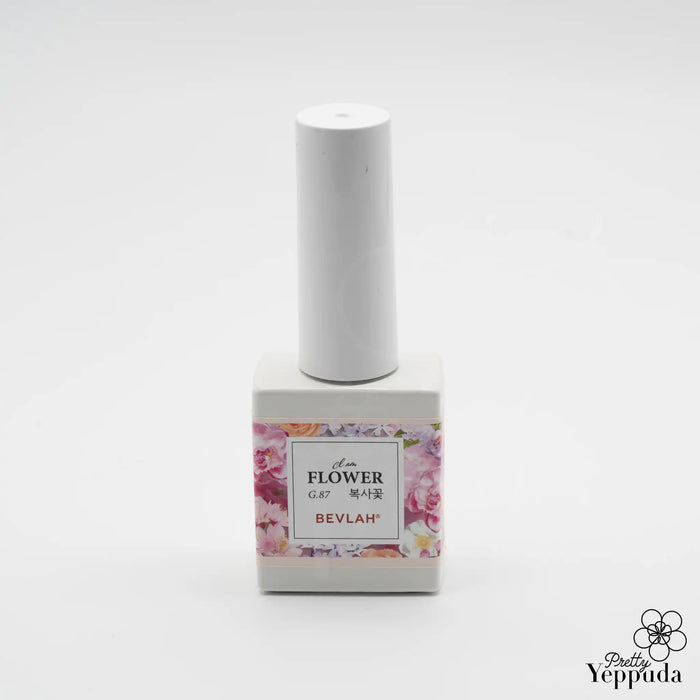 A vibrant and captivating floral product by the renowned BEVLAH brand, featuring a dazzling array of over 70 real flowers and shimmering glitters in a moist petal collection. The size, shape, type, and quantity of the flowers may vary, creating a unique and personalized experience for each customer. This premium flower gel set, free from harsh chemicals, offers a indulgent and luxurious beauty solution.