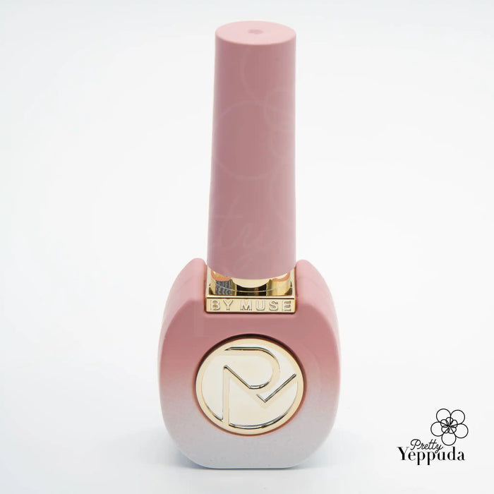 Enchanting Fairy Tale Nail Polish: A vibrant, pastel-hued bottle that evokes the whimsical charm of a spring garden, captivating the senses with its delicate, floral-inspired design. This captivating product by the esteemed By Muse brand invites users to embrace the magical allure of the Fairy Tale collection, infusing nails with the ethereal beauty of nature.