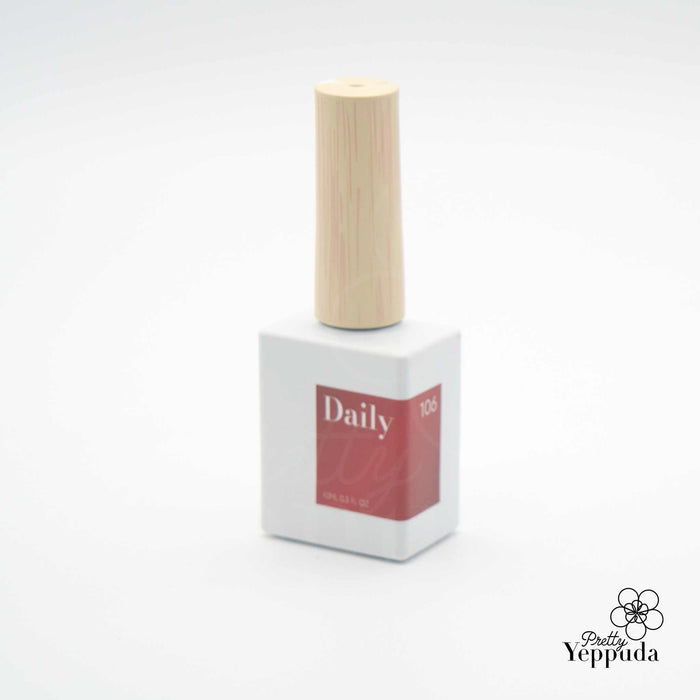 A collection of 10 warm, autumnal nail polish shades from the DAILY 'WOODY' Collection, featuring rosy, maple-inspired, earthy, and deep magnetic tones to capture the essence of fall.