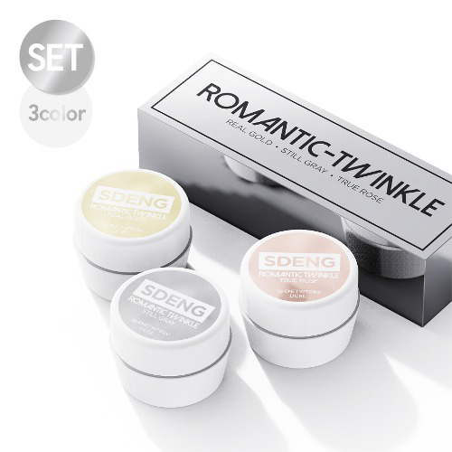 Elegant product presentation of SDENG Romantic Twinkle set in a sleek packaging box. The set includes three jars of glitter gel nail polish in Real Gold, Still Gray, and True Rose, designed to provide a sparkling finish and luxurious look.