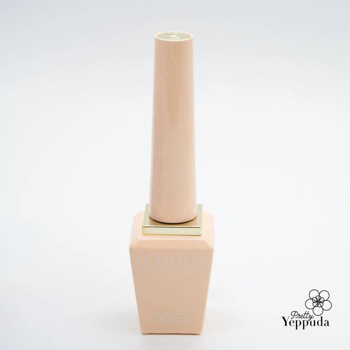 DGEL Signature Cotton Candy Collection: A visually appealing and dreamy gel polish bottle, evoking the sweet and playful essence of cotton candy. The minimalist design and soft peach hue create a sense of joy and happiness, perfect for capturing the essence of this vibrant and whimsical product line.