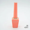 A vibrant, coral-colored DGEL Signature Neon City Collection nail polish bottle with a comfortable handle and high-quality brush bristles, allowing for precise application and control over the 14-free gel formula.