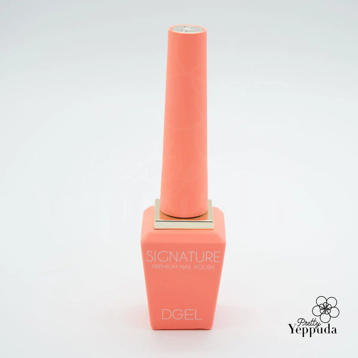 A vibrant, coral-colored DGEL Signature Neon City Collection nail polish bottle with a comfortable handle and high-quality brush bristles, allowing for precise application and control over the 14-free gel formula.