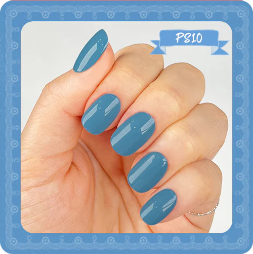 A close-up image of a hand with neatly painted blue nail polish, showcasing the SHOWME Korea Purring Song nail gel collection. The nail gels are known for their vibrant, one-swipe pigmentation and are inspired by the warm, vintage aesthetic of cats. This image highlights the high-quality and professional nature of the SHOWME Korea nail brand, which is popular among nail artists in South Korea.