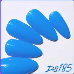 Captivating blue nail polish bottles with a vibrant, glowing appearance, showcasing the innovative DGEL Signature City Pop Collection by the Korean brand. The image highlights the diverse shades, including shimmering hues that evoke the energy and allure of a dynamic city nightlife, perfectly aligning with the product's retro-modern aesthetic and promises of luminescent nail art.