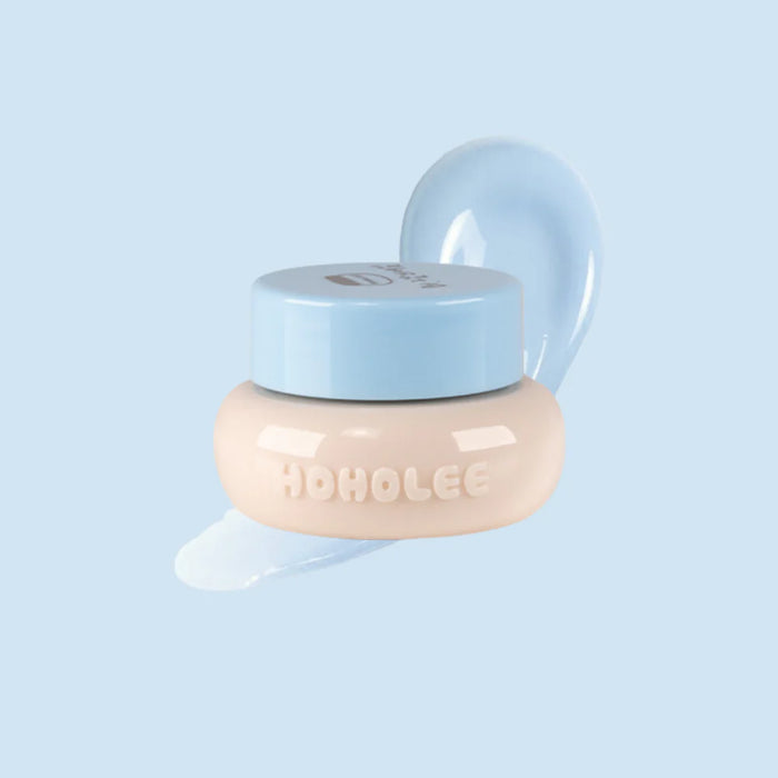 A close-up image of a 3D gel nail product from the Hoholee Collection Ggulbo brand, featuring a round jar with a light blue lid and the brand name prominently displayed. The product appears to be a part of a set designed by the renowned Korean gel artist Gnal_nail and HoHoLee, offering a unique and creative 3D nail art experience for both professional nail artists and DIY enthusiasts.