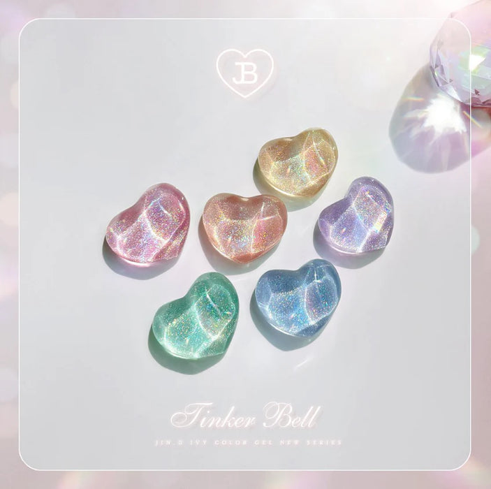 Enchanting heart-shaped cateye nail gels in a vibrant array of rainbow colors, inspired by the whimsical Tinker Bell and infused with a captivating glass-like shimmer, capturing the magical essence of Jin.B's signature collection.