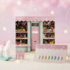 Detailed, elaborative alt text for the "JIN.B Winter Story Collection 8pcs/Set" Shopify product:

"A whimsical winter scene showcasing the JIN.B Winter Story Collection. The image features a cozy, pink-hued cottage adorned with snow-covered trees, festive decorations, and a colorful selection of nail polish bottles prominently displayed. The product details, including the 8-piece set and volume information, are presented on a coordinating pastel 