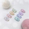 Winter Story Collection 8pcs/Set: An elaborate set of 8 colorful, ice-inspired gel products from the JIN.B Shopify brand. The image showcases the range of pastel and iridescent shades available, perfect for crafting stunning winter-themed designs and artwork.