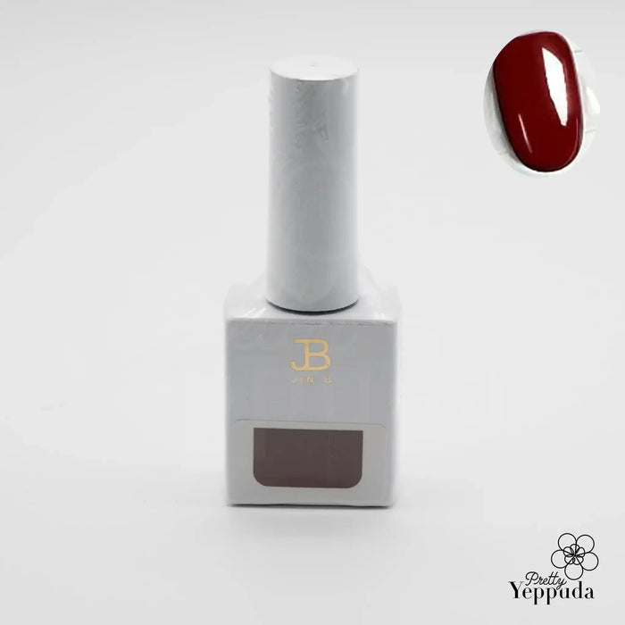 Elaborative Alt Text: A stylish and minimalist image showcasing the JIN.B IVY Yo So Sexy 6pc Collection, a special red edition created by the brand. The set includes six different red tints of single gel nail polish, presented in a sleek white packaging with the brand's logo prominently displayed. The image highlights the deep, vibrant red shade of one of the polishes, emphasizing the high-quality, long-lasting formula and the brand's dedication 