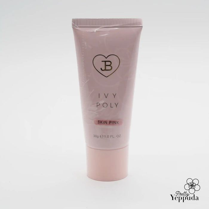 JIN.B IVY Poly Gel Skin Pink product image showing a pink-colored tube with the brand's logo and product name "IVY POLY SKIN PINK" prominently displayed, highlighting the key features of the gel extensions that cure in 60-120 seconds under UV/LED and are part of a set with 3 color options - clear, pink, and milk.