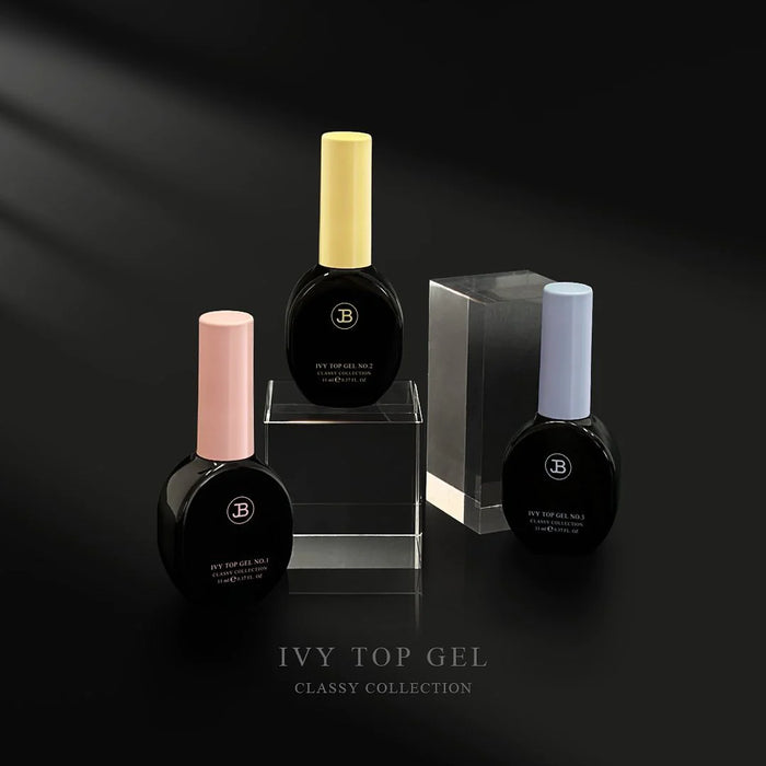 Elegant Ivy Top Gel nail products in a sophisticated black and white display, featuring the JIN.B brand and promoting the Ivy Top Gel No.1 formula - a shiny, air bubble-free top coat that protects the original base color and offers great nail retention, available in 11ml volume.