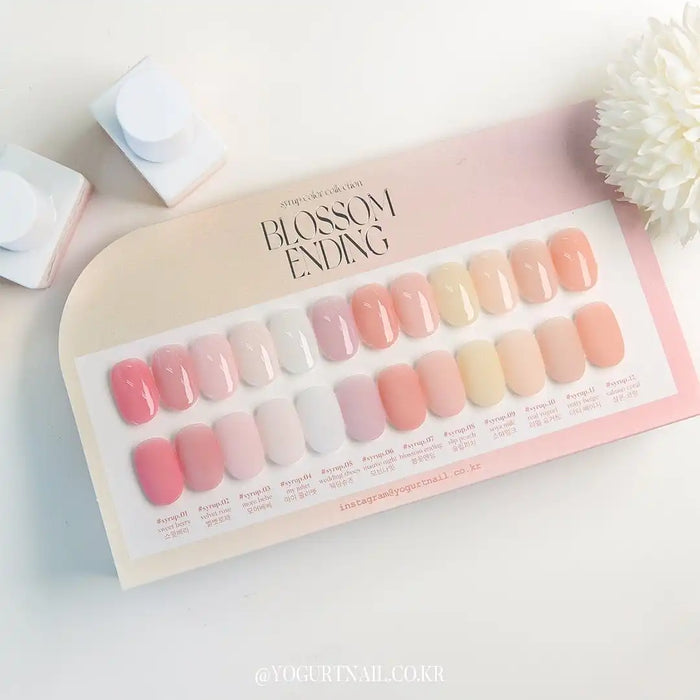 Detailed image of a Shopify product called "YOGURT Blossom Ending Collection 12 syrup gels", showcasing a variety of pastel-colored nail polish gel swatches. This image could be used to highlight the diverse range of natural, sheer, and self-leveling gel polish colors offered in the Blossom Ending collection by Yogurt Nail Kr.