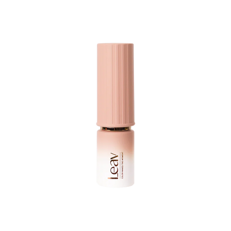 Elegant LEAV Filter Syrup Gel bottle in soft peach color with gold-accented cap, showcasing luxurious packaging for hema-free nail gel. Product label visible, reflecting high-quality and professional nail care solution from the LEAV brand. Part of a 20-color set for versatile nail art and design options.