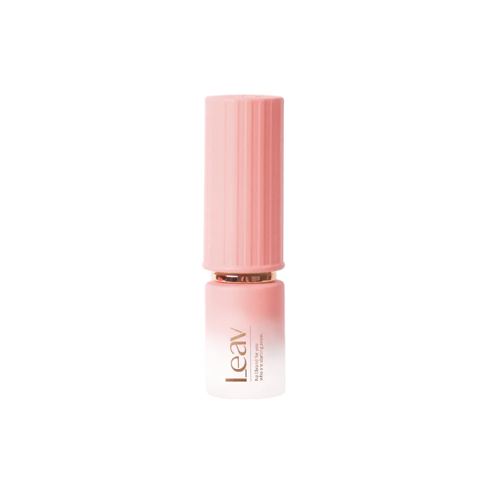 The image depicts the Leav Fairy Tale Collection with 8 Gel polishes, showcasing a pastel-colored syrup gel polish bottle in a unique lipstick-style packaging. The bottle features the Leav brand name prominently displayed, highlighting the product's distinct and whimsical design. This alt text effectively captures the key visual elements of the Shopify product, providing customers with a detailed and accurate description to enhance their online s