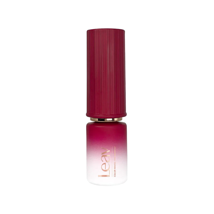 A vibrant and captivating nail polish bottle from the LEAV Gloaming Sunset Collection, showcasing a mesmerizing gradient effect that captures the enchantment of the twilight sky. The bottle's sleek and modern design, with its burgundy and pink hues, promises to elevate any nail art to a sophisticated and luxurious level.