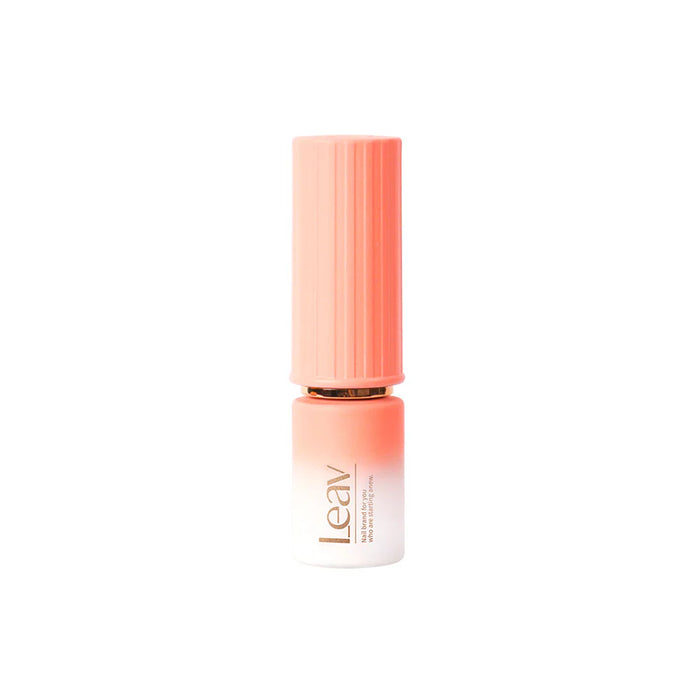 This elaborative alt text describes the "LEAV Fanfare Collection with 8 Playful Pastel Gels" Shopify product image, featuring a close-up view of a lipstick-style gel polish bottle in a soft peach color. The packaging design includes a cylindrical shape with vertical ridges, a metallic accent, and a pastel pink cap, showcasing the high-quality, salon-suitable formula of this 8ml, 60S UV/LED gel polish from the Fanfare Collection.