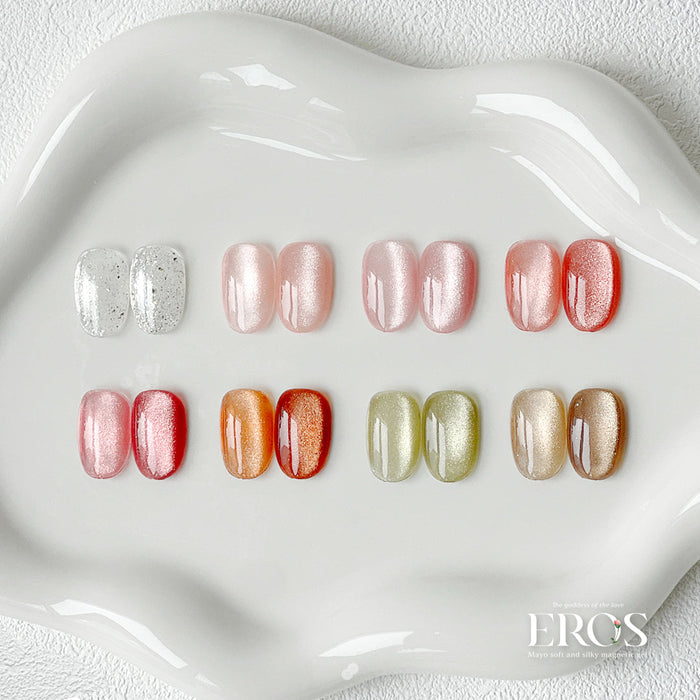 Assortment of elegant nail polish shades from the MAYO Eros Collection, showcasing a diverse range of captivating colors inspired by the goddess of love, including delicate pinks, vibrant reds, serene greens, and shimmering golden hues.