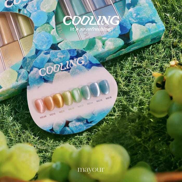 The image showcases the MAYOUR Cooling Collection, a set of 8 magnetic gel polishes designed to bring a refreshing twist to your manicure. The set features a diverse palette of cool, icy hues that shimmer like frost, accented by mesmerizing magnetic glitters. The polishes are easy to apply and require only a minute of curing under UV/LED light to achieve a flawless finish. With a generous 10ml bottle size, this collection offers the perfect solut