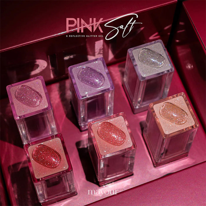 Reflective and shimmering gel nail polish set in vibrant, sparkling shades of pink and rose gold, showcasing the MAYOUR Pink Salt Collection.