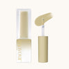 Elegant cream-colored nail gel bottle and applicator from MAYOUR The Collector Season 1 set, showcasing luxurious packaging and smooth texture of the syrup gel product for artistic nail designs and crafts