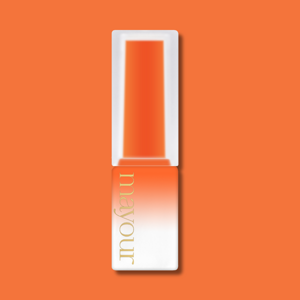 Vibrant orange MAYOUR syrup gel polish bottle on bright orange background, showcasing the brand's sleek design and seasonal color palette for nail art enthusiasts