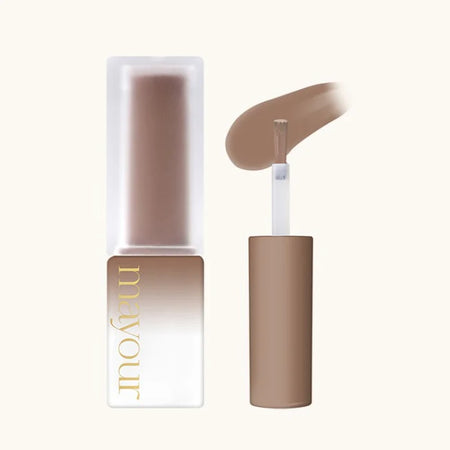 The image shows a beauty product, specifically a nail polish or gel product from the MAYOUR Golden Hour Collection. The product appears to be a nude or beige color, with a minimalistic and elegant packaging design. The image highlights the product's features, such as the vibrant shades, quick-drying formula, and versatility, making it suitable for both professional and enthusiastic nail art enthusiasts.